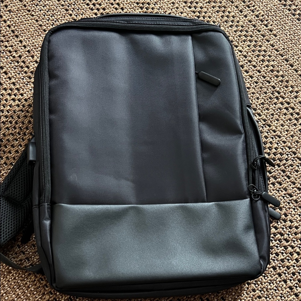 Sleek Black Structured Backpack With Adjustable S… - image 1